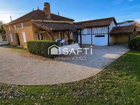 maison de village avec 2 chambres  grande pièce a vivre et dépendances sur un terrain d'en