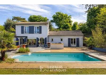 maison avec vue dégagée  piscine et jardin arboré sur les hauteurs du 5ème