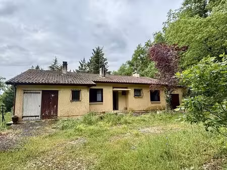maison à rénover avec jardin et garage