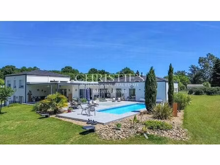 contemporary paradise: sustainable villa with pool and expansive gardens with id 358697474
