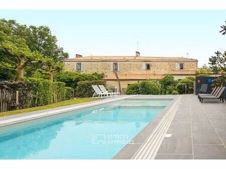 longère avec gîte et piscine : l'élégance au coeur d'une peupleraie