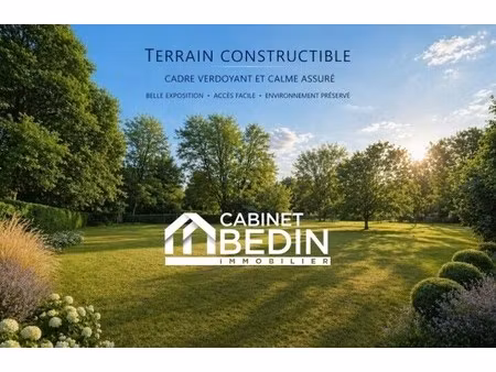 terrain 1295 m²