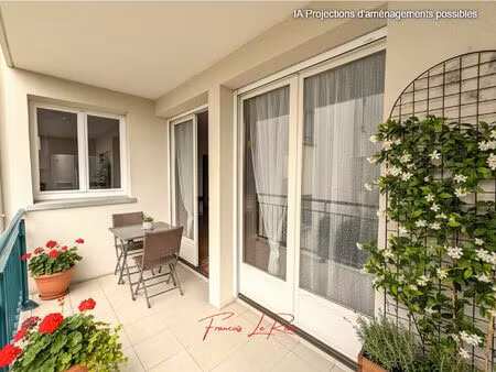 appartement 4 pièces (78 m²) avec grand balcon et 2 stationnements - centre ville - réside