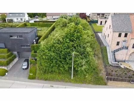 terrain constructible de +/-7a84ca situé à huldenberg