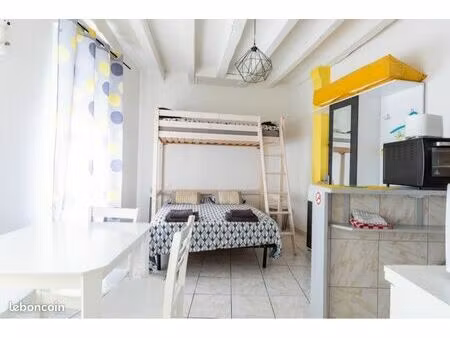 immeuble comprenant 2 logements en location