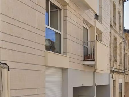 appartement t2 de 52m2  résidence récente  balcon  parking  plein de cœur de ville