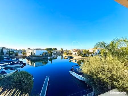 marina t4 en r+1 de 102 m² avec garage communiquant - place de parking - appontement & cat