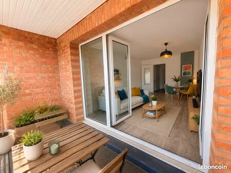 brs - t3 avec balcon et box de stationnement idéalement situé