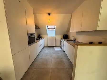 appartement dans le centre de bree avec place de parking