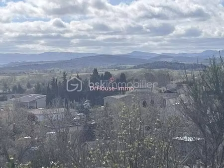 terrain sur les hauteurs d 'un petit village charmant à 5 mn de limoux
