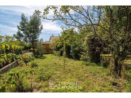 un appartement comme une maison de ville avec son jardin et son garage