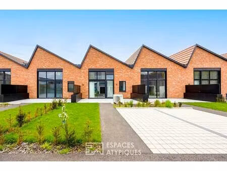 loft contemporain en duplex et sa terrasse dans une ancienne friche industrielle