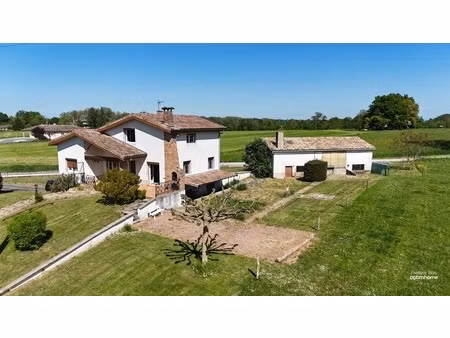 maison avec grands volumes et fort potentiel sur grièges – terrain de plus de 4 000 m²