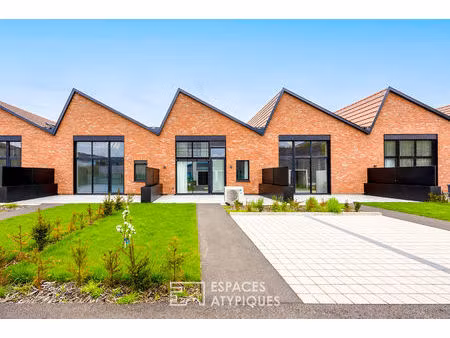 loft contemporain en duplex et sa terrasse dans une ancienne friche industrielle