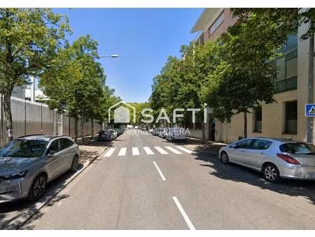 exclusivité cours barbey : une place de parking en sous-sol sécurisé de 12 m² (4 places à 