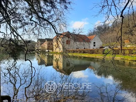 propriete avec un terrain de 13 4 ha  etang