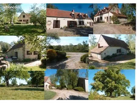 propriété composée d'une maison  d'un hangar et de prés