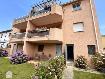 appartement t4 de 84m2 avec jardin  place de parking et gara