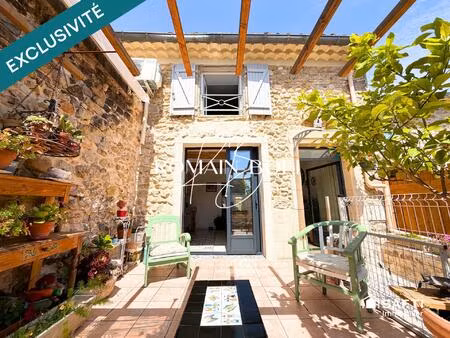 maison 4 pièces de 136m2 avec cour et terrasse