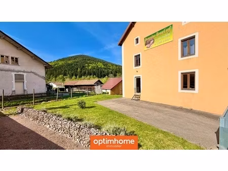 ventron – maison mitoyenne avec jardin clos  dépendances et fort potentiel d’aménagement