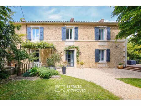 maison ancienne rénovée avec piscine