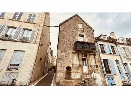 immeuble de rapport avec 3 appartements en pierre apparentes situé rue du bel air à...