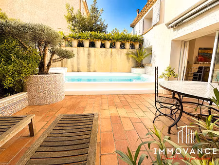 maison de village avec patio  piscine à débordement  garage et