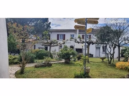 grande maison et possibilités commerces