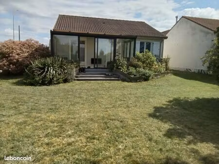 maison plain-pied et sous sol d'environ 98 m2 de 5 pièces avec véranda