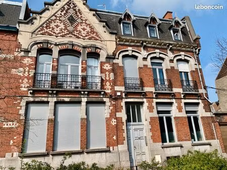 local rdc activité bureaux commerce 107m2 + 2 parking sécurisés dans belle bâtisse ancienn