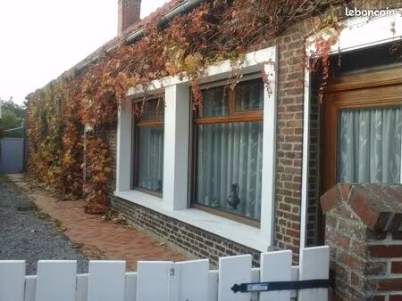 maison individuelle indépendante au coeur du village avec local commercial + garage atelie