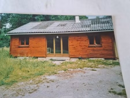 a vendre chalet 70m carré deux chambres salon salle à manger 28m carré cuisine salle d'eau