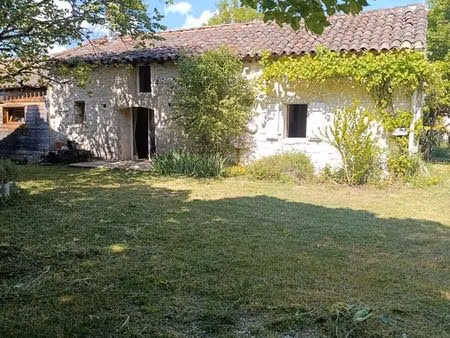 maison en pierre avec dépendances sur terrain arboré de 1500 m2