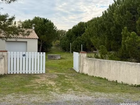 terrain à bâtir avec garage existant proche mer