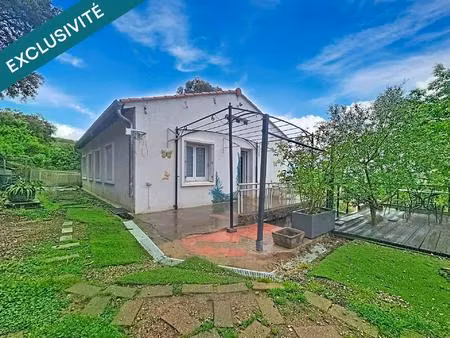 une villa de plain-pied avec sous-sol total et vue dominante  dans un environnement calme 