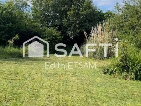 à vendre – terrain constructible de 1747m²  borné et paysagé  au calme