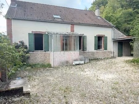 fermette sur 2600 m2 de terrain en partie boisée