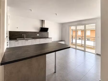 à vendre - appartement t3 lumineux avec balcon et garage - saint-laurent-sur-saône (01750)
