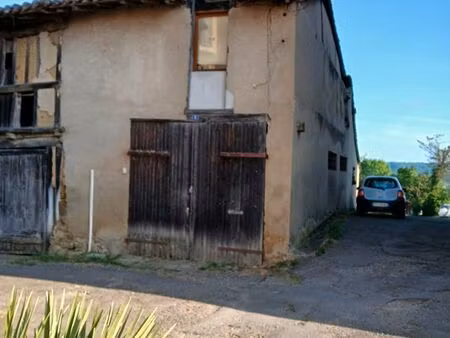 immeuble 100 m2 à usage de dépôt et garage 3 pieces