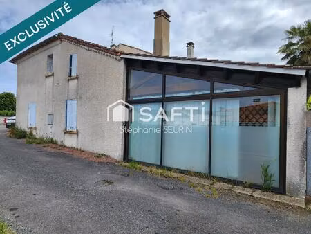 maison avec véranda et double garage