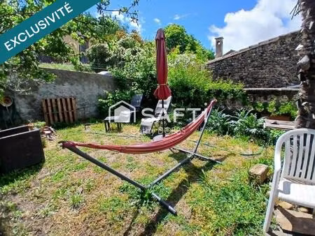 exclusivité: maison de village avec jardin et garage