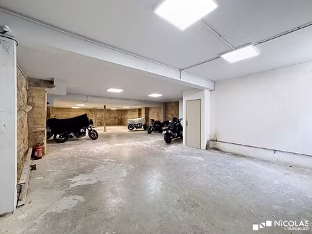 garage 150 m² – jardin public / paul-doumer