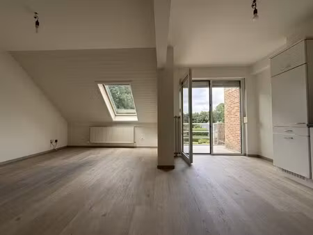 leuk duplex-app. met 2 slaapkamers  terras en parking