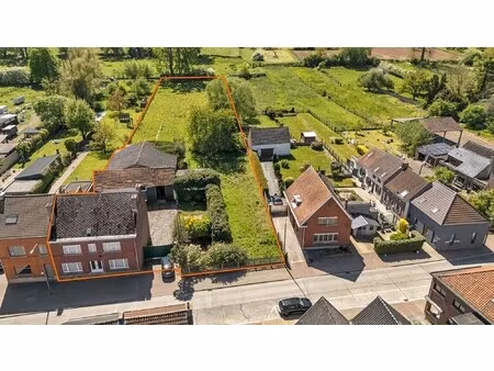 ruime te renoveren woning met loods en bouwgrond
