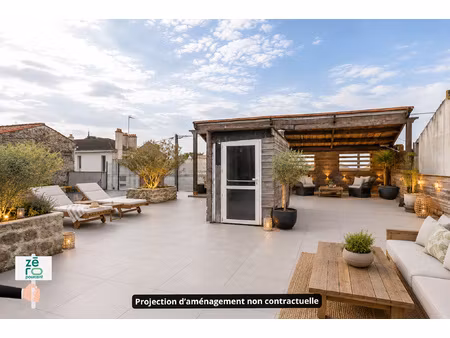 maison atypique avec toit-terrasse de 200 m2 à avrillé 5 p