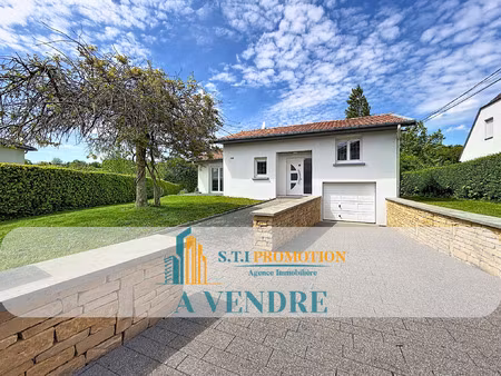 maison individuelle avec véranda panoramique et terrain de 1