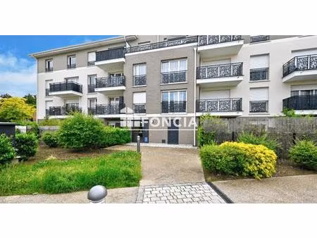 jouy-le-moutier f3 avec jardin et parking sous-sol dans une résidence de 2018