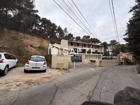 t2 + véranda  garage et place de parking