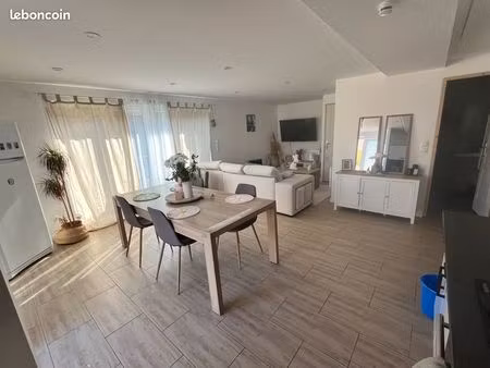 appartement rdc avec entrée/parking privatif