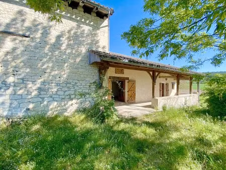 charmante maison en pierre avec grange attenante